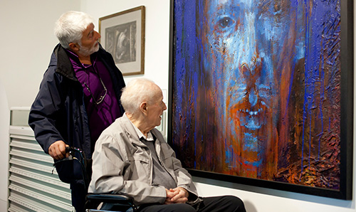 man in a wheelchair at Whitworth Art Gallery